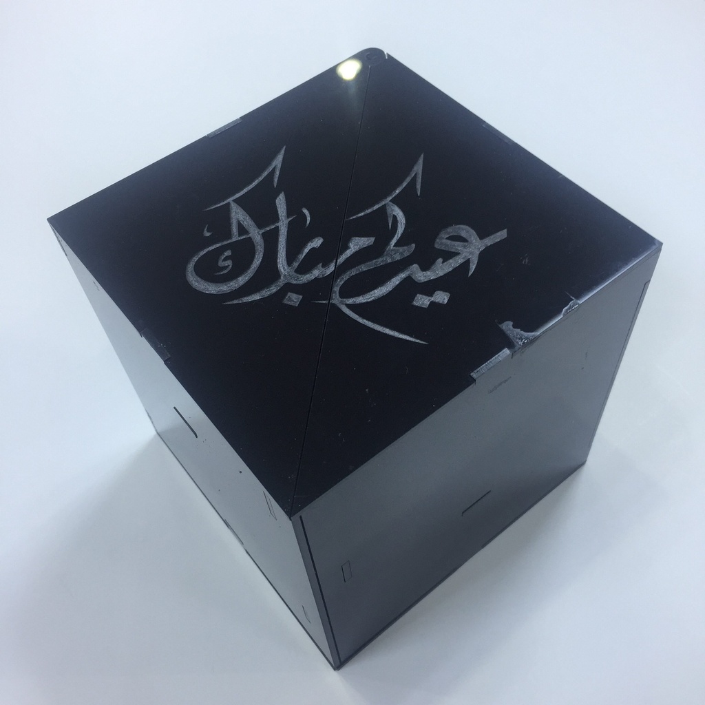 Black acrylic box with hidden drawers
